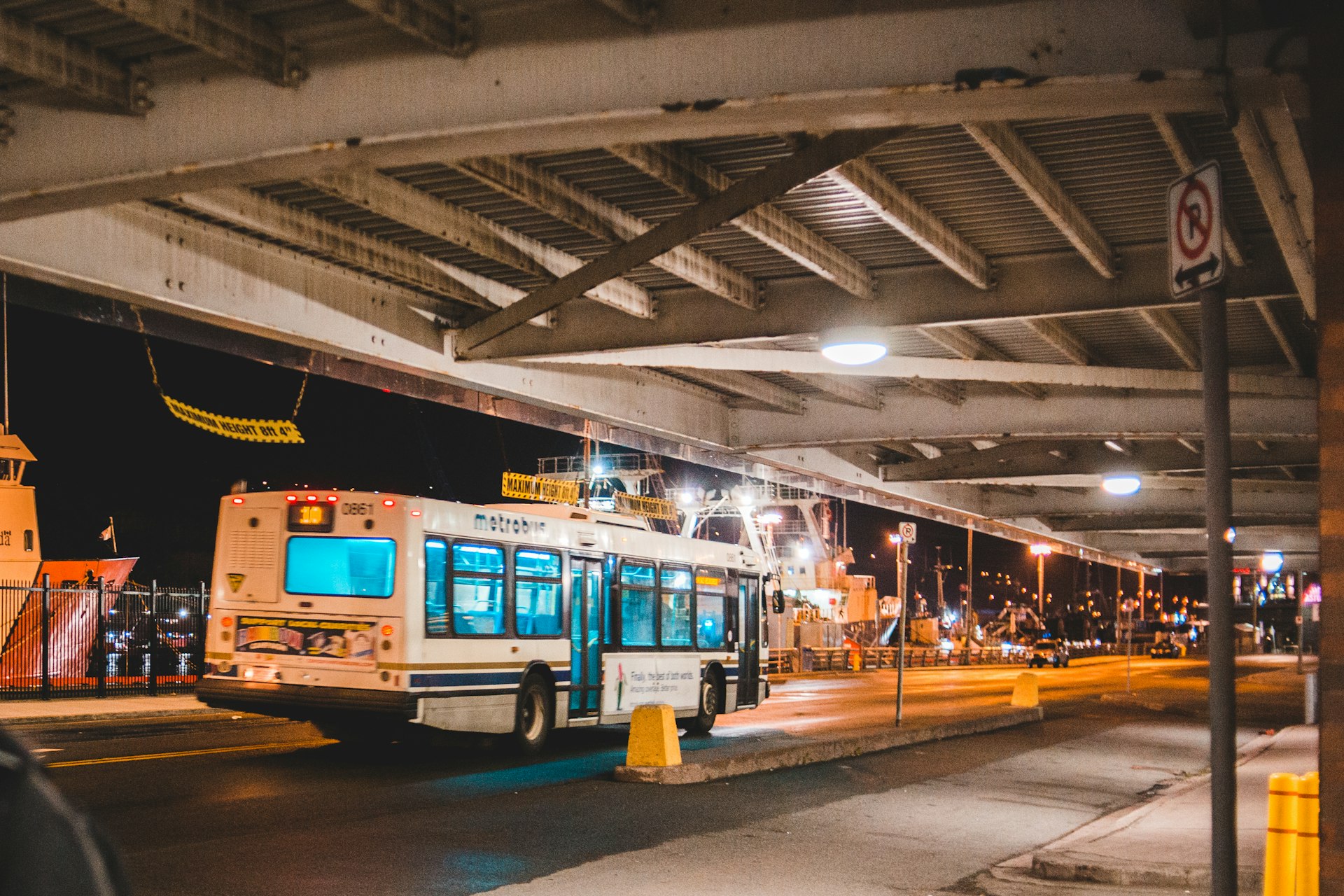 yellow and white bus on road during daytime